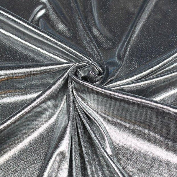 metallic lame. silver on black. 100% polyester. Fabric Focus