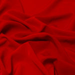 Beautiful self coloured crepe with great drape.  Suitable for day and evening wear alike. 100% Polyester. Sold in half meter lengths.
