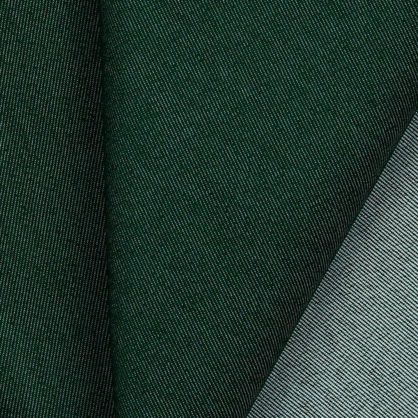 Mid-weight polyester cotton mix denim with a hint of stretch. Available in numerous fashion shades including this deep Dark Green and ideal for clothing, bag making and lighter furnishing applications. Available to buy in half metre increments.
