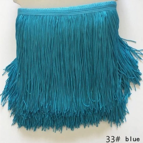 polyester fringe in azul blue. 15cm deep. Available to buy in store and online at Fabric Focus Edinburgh.