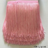 polyester fringing in pale pink. 15cm deep. Available to buy in store and online at Fabric Focus Edinburgh
