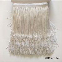 polyester fringe in white. 15cm deep. Available to buy in store and online at Fabric Focus Edinburgh.