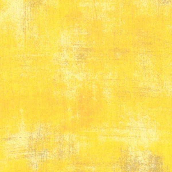 A bright, sunflower yellow grunge print. Grunge Basics from Moda Fabrics is one of our favorite blenders ever! Grunge is great for adding that little extra something to a quilt, like texture and depth.  Available in quarter metre increments at Fabric Focus.