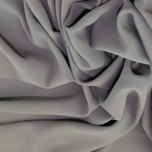This beautiful crepe lives up to its name - Prestige! A soft handle with beautiful drape.  Available in various shades including this soft mid-grey. It is machine washable at 30 degrees and easy to sew.  Sold in half meter lengths.