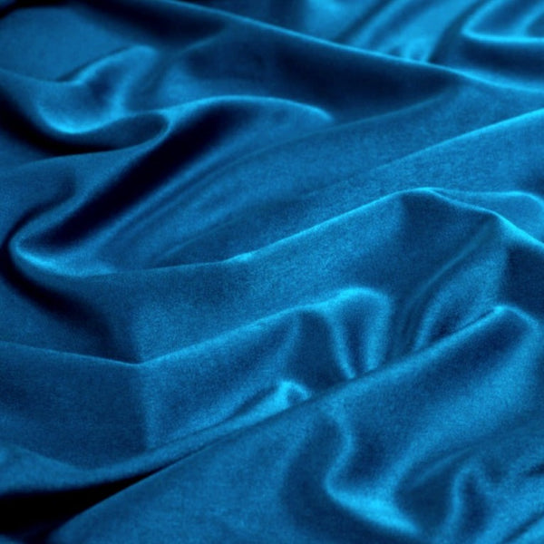 Satin Backed Crepe is a beautiful fabric for draping and is truly reversible. Satin and matt complements each other and both sides can be used in the same garment. Prada, satin back crepe is available in many beautiful colours, this being the rich teal.  Sold in half meter lengths at Fabric Focus.