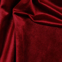 Gorgeous Luxury Velvet with a superb sheen and a deep rich pile suitable for dressmaking, crafts and soft furnishings as well as curtains. Available in an array of beautiful shades, this being a deep rich pinky red. Available to buy online in half metre increments.