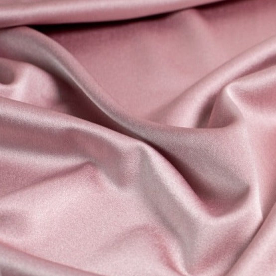 Satin Backed Crepe is a beautiful fabric for draping and is truly reversible. Satin and matt complements each other and both sides can be used in the same garment. Prada, satin back crepe is available in many beautiful colours, this being the romantic Light Rose.  Sold in half meter lengths at Fabric Focus.