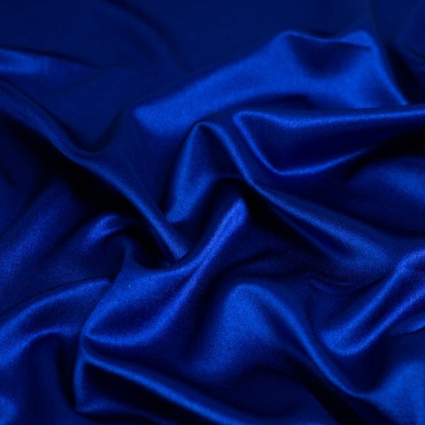 Satin Backed Crepe is a beautiful fabric for draping and is truly reversible. Satin and matt complements each other and both sides can be used in the same garment. Prada, satin back crepe is available in many beautiful colours, this being the rich royal blue.  Sold in half meter lengths at Fabric Focus.