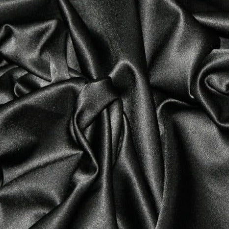 Prada reversible satin back crepe in a rich black colourway. Available online and in store at Fabric Focus Edinburgh.