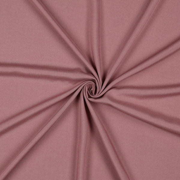 A beautiful plain viscose fabric in a stunning soft Blush Pink colour. perfect for wrap dresses, wide legged trousers and blouses. Mix with printed viscose for a great summer ensemble. Available to buy in half metre increments at Fabric Focus.