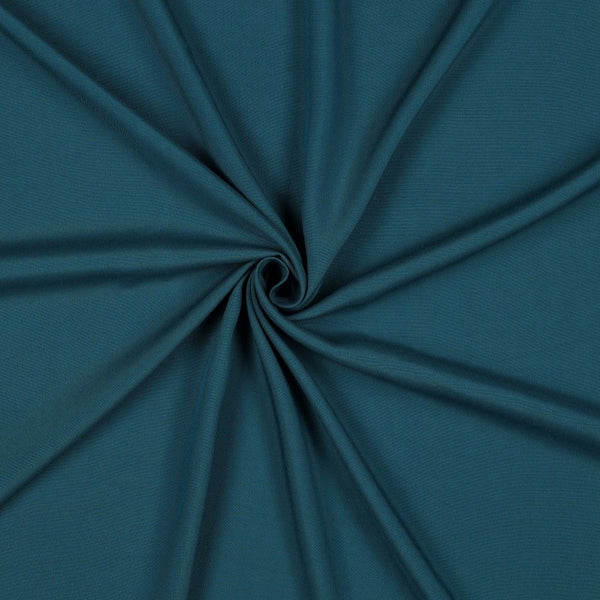 A beautiful plain viscose fabric in a stunning rich Teal colour. perfect for wrap dresses, wide legged trousers and blouses. Mix with printed viscose for a great summer ensemble. Available to buy in half metre increments at Fabric Focus.