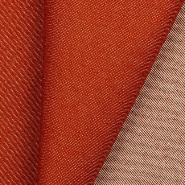 Mid-weight polyester cotton mix denim with a hint of stretch. Available in numerous fashion shades including this rich Rust/Orange and ideal for clothing, bag making and lighter furnishing applications. Available to buy in half metre increments.