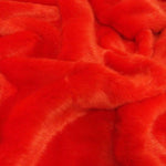 Luxury faux fur in a spicy orange, aptly named Flame. Available in store and online at Fabric Focus.