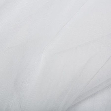 A sheer soft tulle perfect for bridal veiling, wedding/evening dresses, craft and embellishment. Premium quality, this tulle is non-fray for easy use. Super-soft and extra wide in the silk white colourway - the mid of the three bridal shades available.  Available to buy in half metre increments at Fabric Focus.