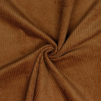 Lustrous and soft, Corduroy is also extremely durable and can be used in dressmaking, for soft furnishings and toys and even for upholstery. This is approximately a 4.5 wale. And comes in many wearable colours, this being a creamy Cognac. Available to buy online in half metre increments.
