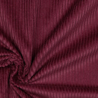 Lustrous and soft, Corduroy is also extremely durable and can be used in dressmaking, for soft furnishings and toys and even for upholstery. This is approximately a 4.5 wale. And comes in many wearable colours, this being a rich Berry. Available to buy online in half metre increments.